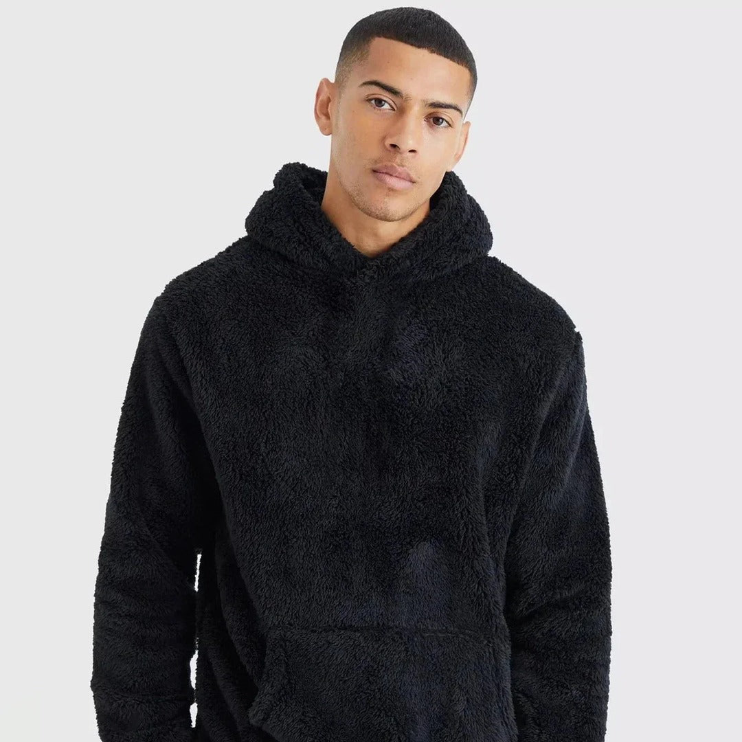 Men's fluffy borg hoodie in black, worn, front view