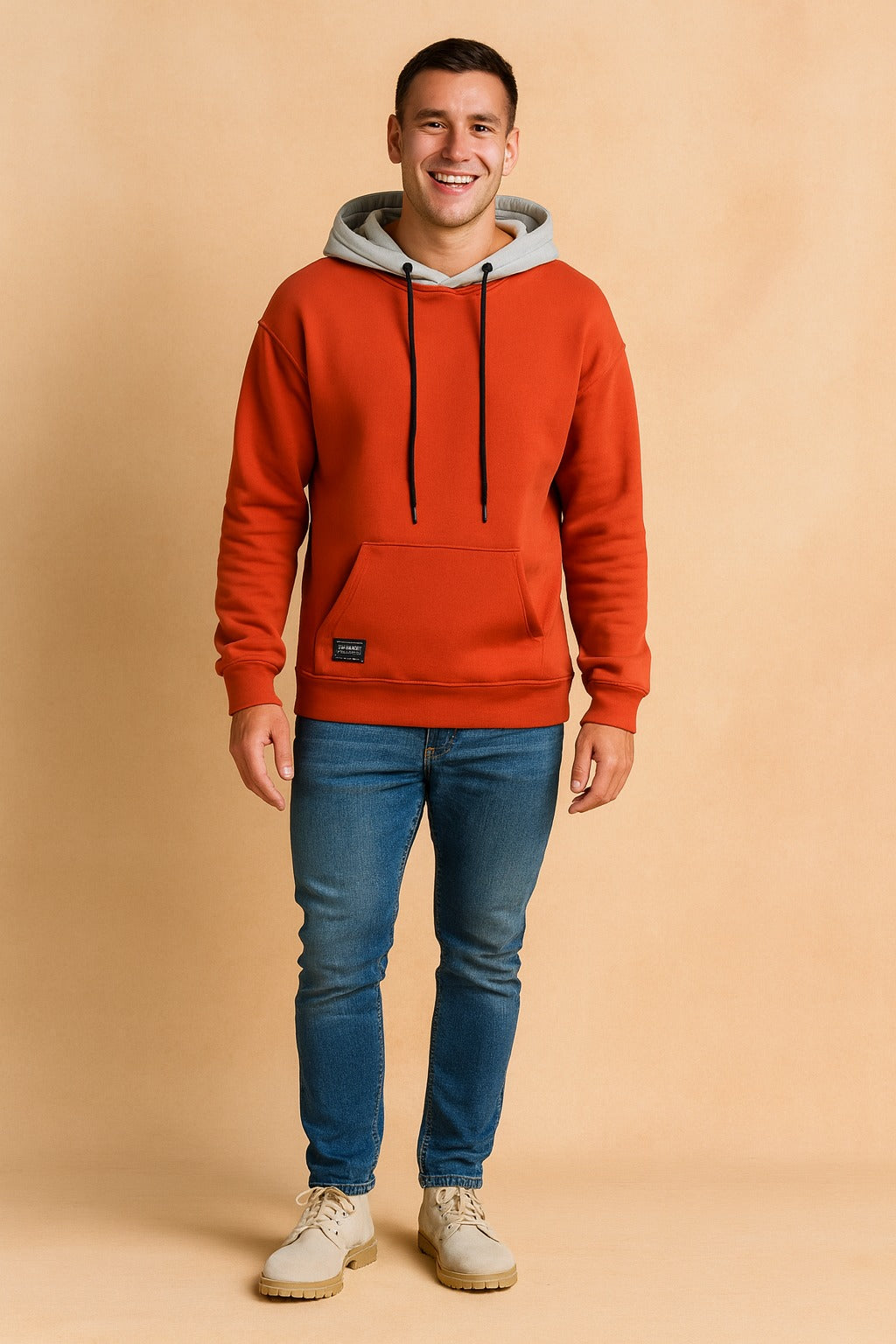 Men's two-tone hoodie with contrast hood in orange, worn, front view