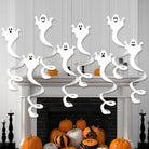 Eight ghost swirls hanging above a fireplace