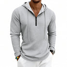 Men's textured quarter-zip hoodie in light grey, worn, front view