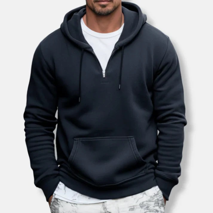 Men's quarter-zip hoodie in navy, worn, front view