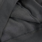 Men's heavyweight cotton hoodie in dark grey, close-up of the soft brushed inside