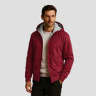 Men's sherpa-lined zip hoodie in burgundy, worn, front view