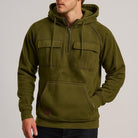 Men's half-zip utility hoodie with chest pockets in olive green, worn, front view