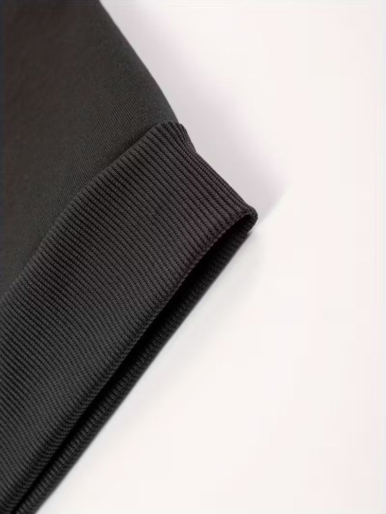 Men's soft-lined winter hoodie in black, close-up of the ribbed cuff