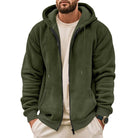 Men's waffle zip hoodie in dark green, worn, front view
