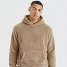 Men's fluffy borg hoodie in brown, worn, front view