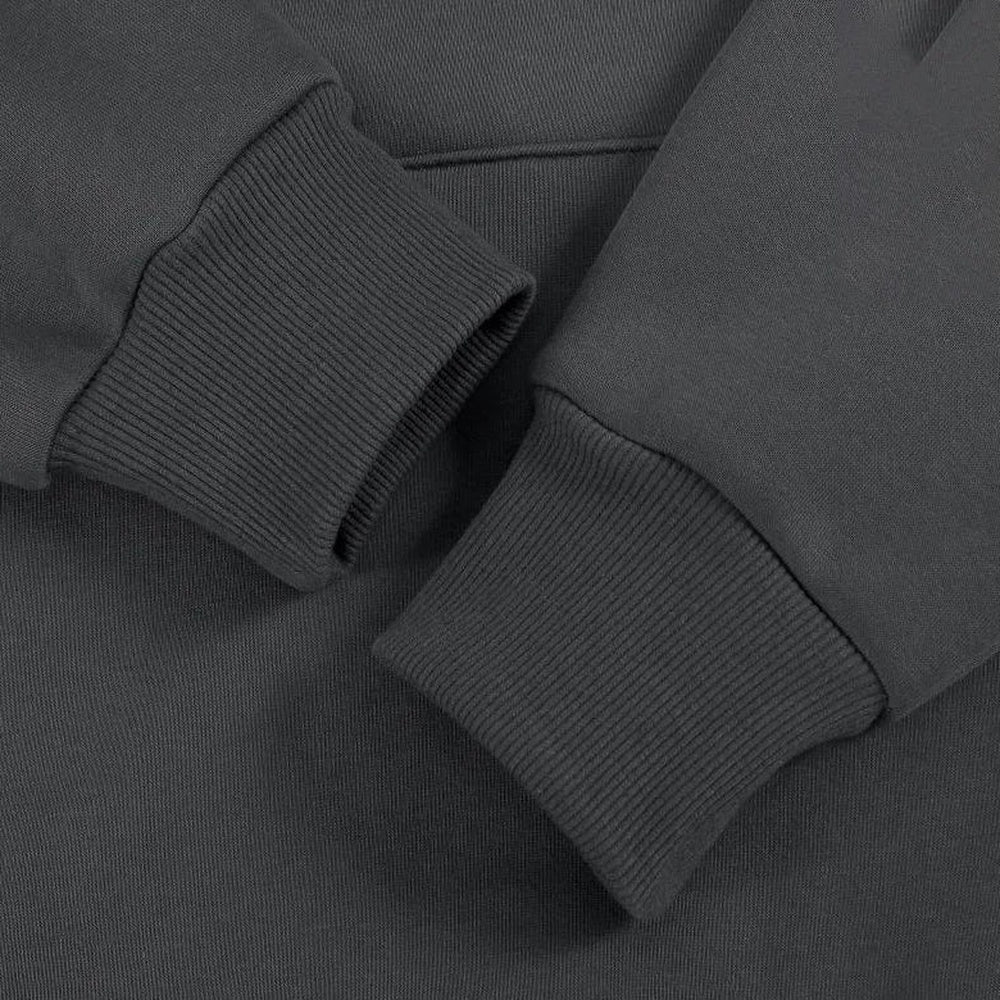 Men's heavyweight cotton hoodie in dark grey, close-up of the ribbed cuff