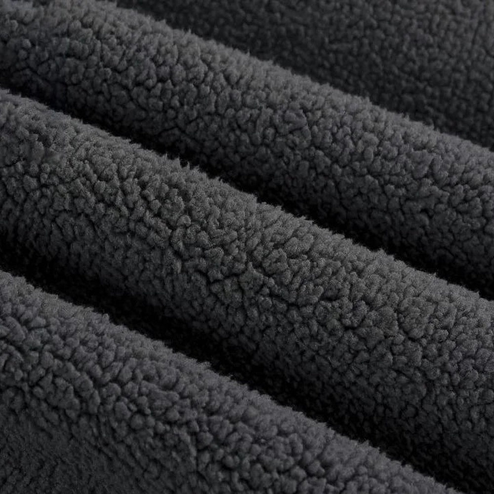 Men's heavyweight cotton hoodie in black, close-up of the brushed inside texture