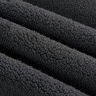 Men's heavyweight cotton hoodie in black, close-up of the brushed inside texture