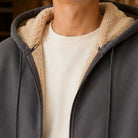 Men's zip-through hoodie in grey, close-up of the sherpa-lined hood