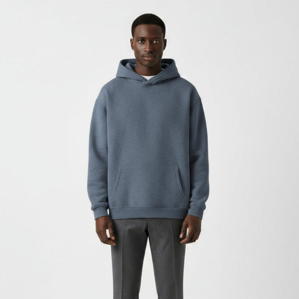 Men's heavyweight hoodie in washed blue, worn, front view