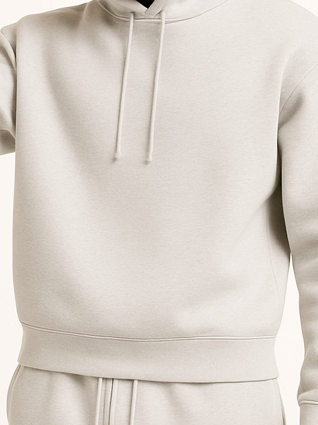 Men's relaxed-fit hoodie in grey, close-up of the drawstrings and the ribbed hem