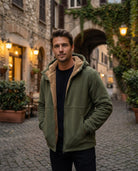 Men's sherpa-lined zip-up fleece in army green, worn, front view