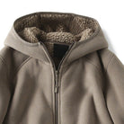 Men's sherpa-lined fleece jacket with hood in taupe, close-up of the sherpa-lined hood and the zip