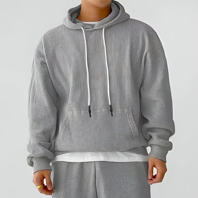 Men's ribbed oversized hoodie in grey, worn, front view