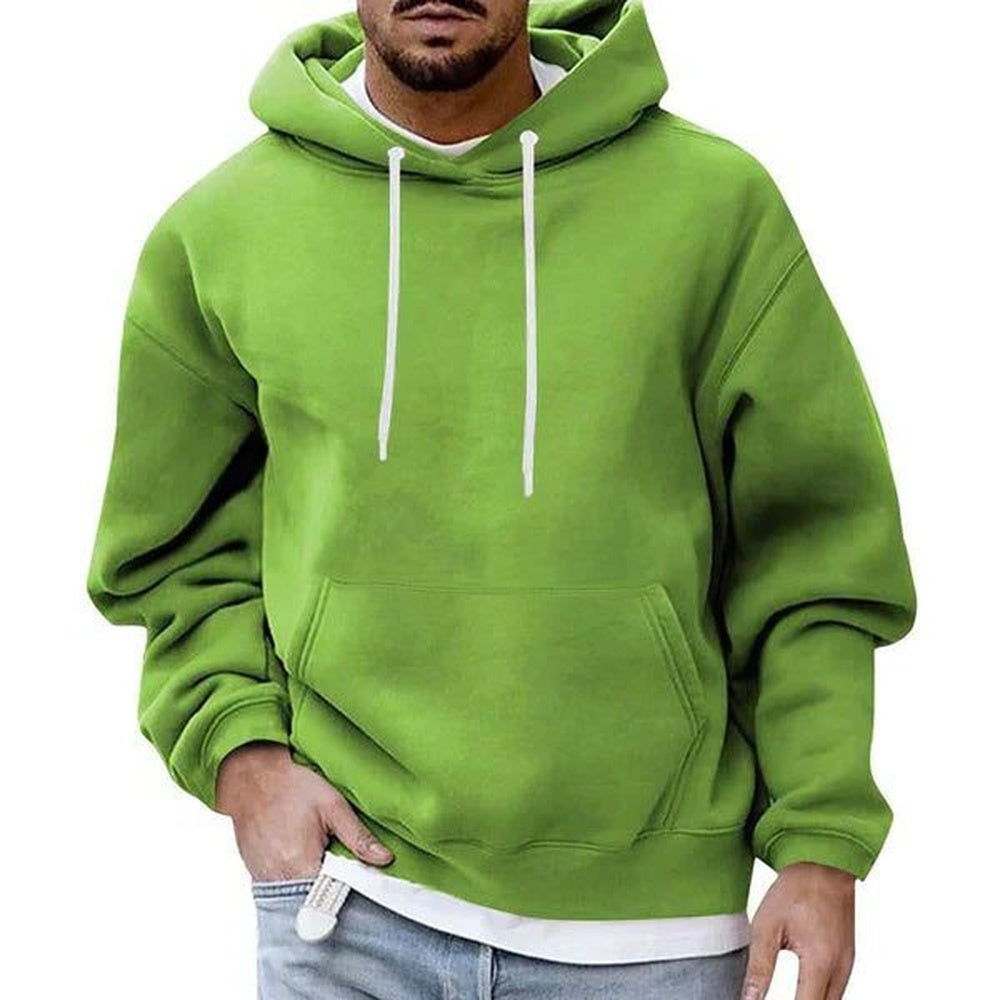 Men's oversized hoodie in light green, worn, front view