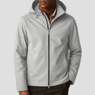 Men's hooded zip jacket in light grey, worn, front view