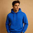 Men's classic drawstring hoodie in blue, worn, front view