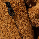 Men's hooded borg jacket in camel, close-up of the zip puller and the fluffy pile