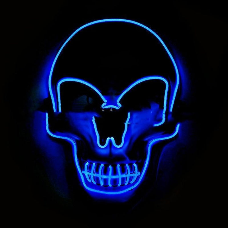 Blue LED skull mask glowing in the dark
