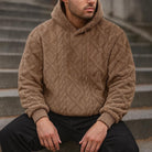 Men's quilted teddy fleece hoodie in brown, worn, front view