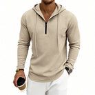 Men's textured quarter-zip hoodie in beige, worn, front view
