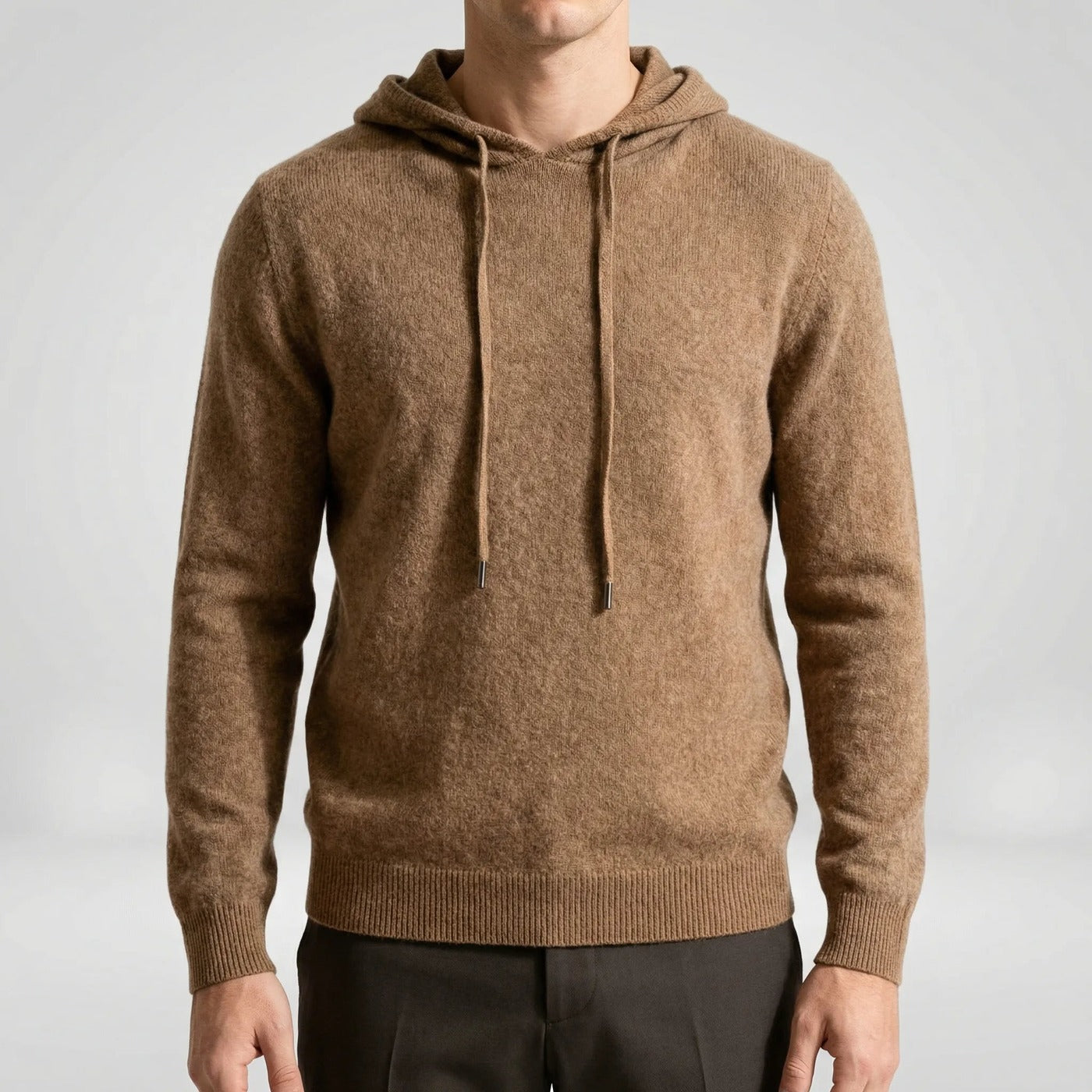 Men's fine-knit hooded jumper in brown, worn, front view with the arms at the sides