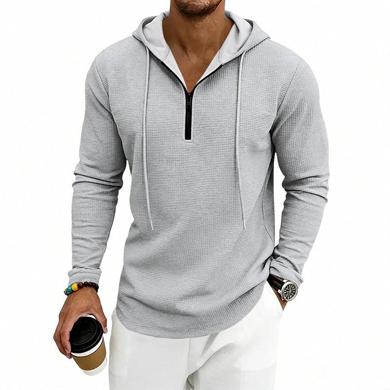 Men's textured quarter-zip hoodie in light grey, worn, front view