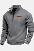 Dark grey funnel neck sweatshirt with a tall collar and ribbed cuffs, product shot | Chaps London