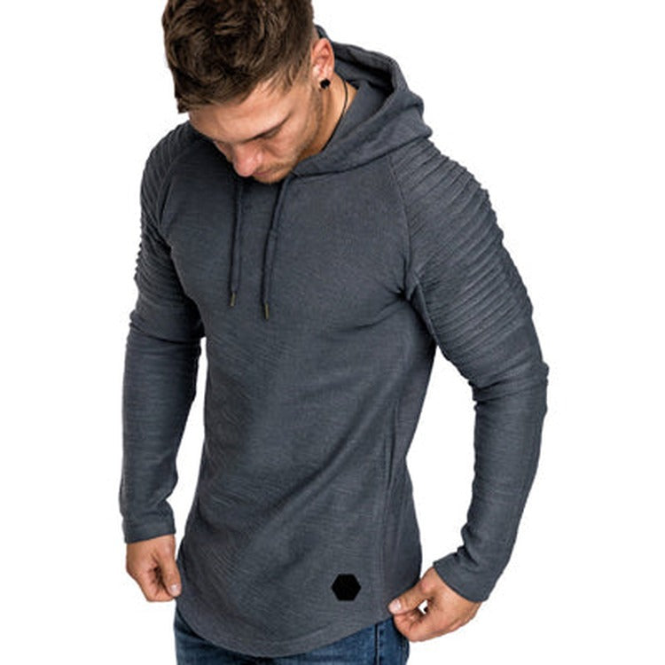 Men's slim-fit hoodie with ribbed sleeves in grey, worn, front view