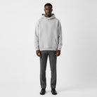 Men's heavyweight hoodie in grey, worn, front view