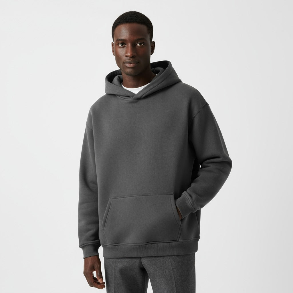 Men's heavyweight hoodie in dark grey, worn, front view