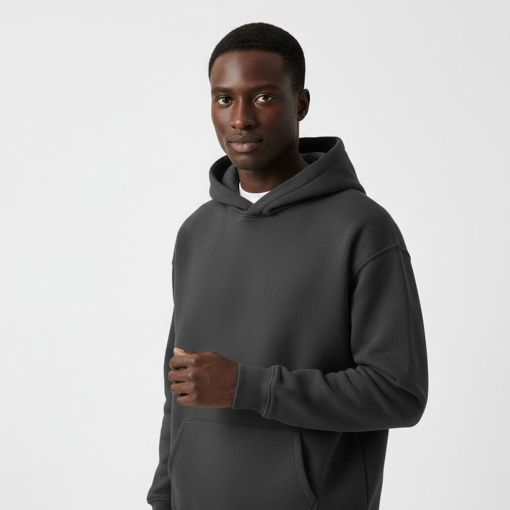 Men's heavyweight hoodie in dark grey, worn, front view