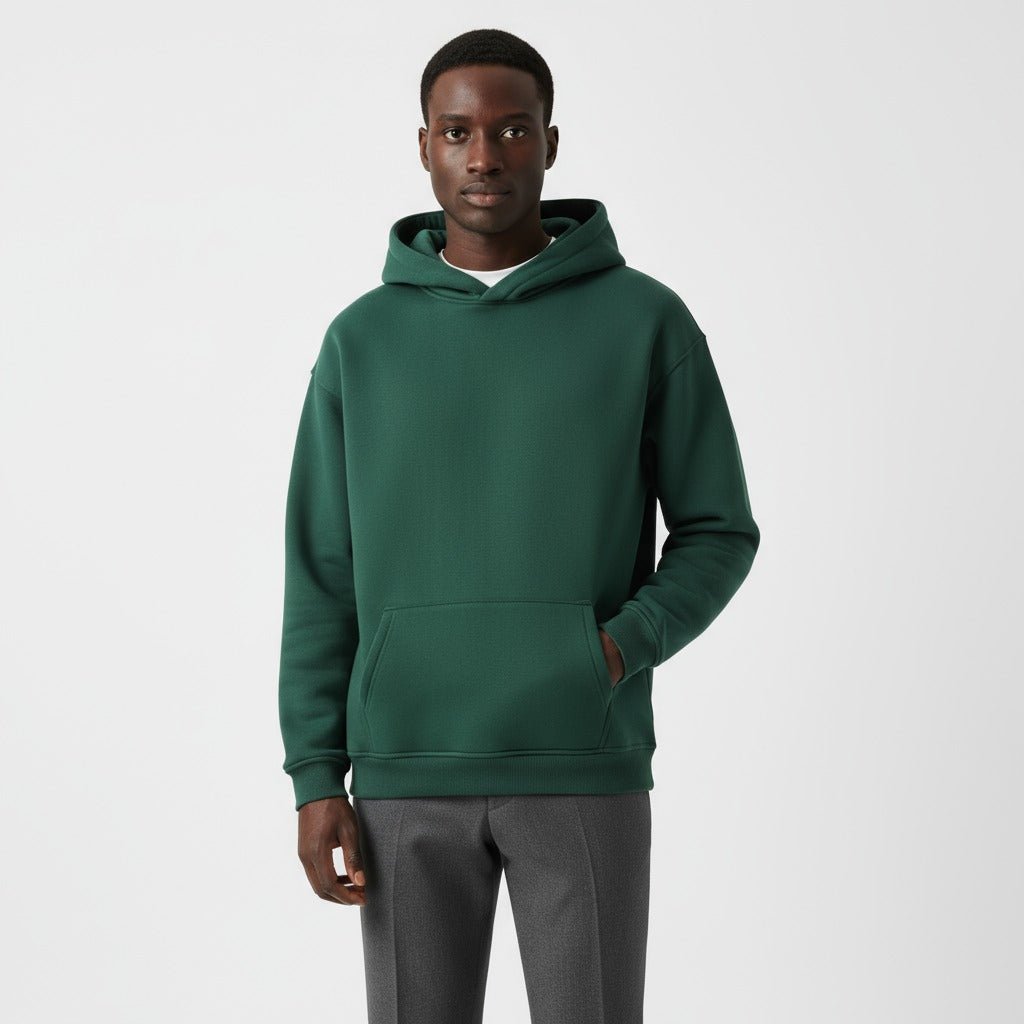 Men's heavyweight hoodie in deep green, worn, front view