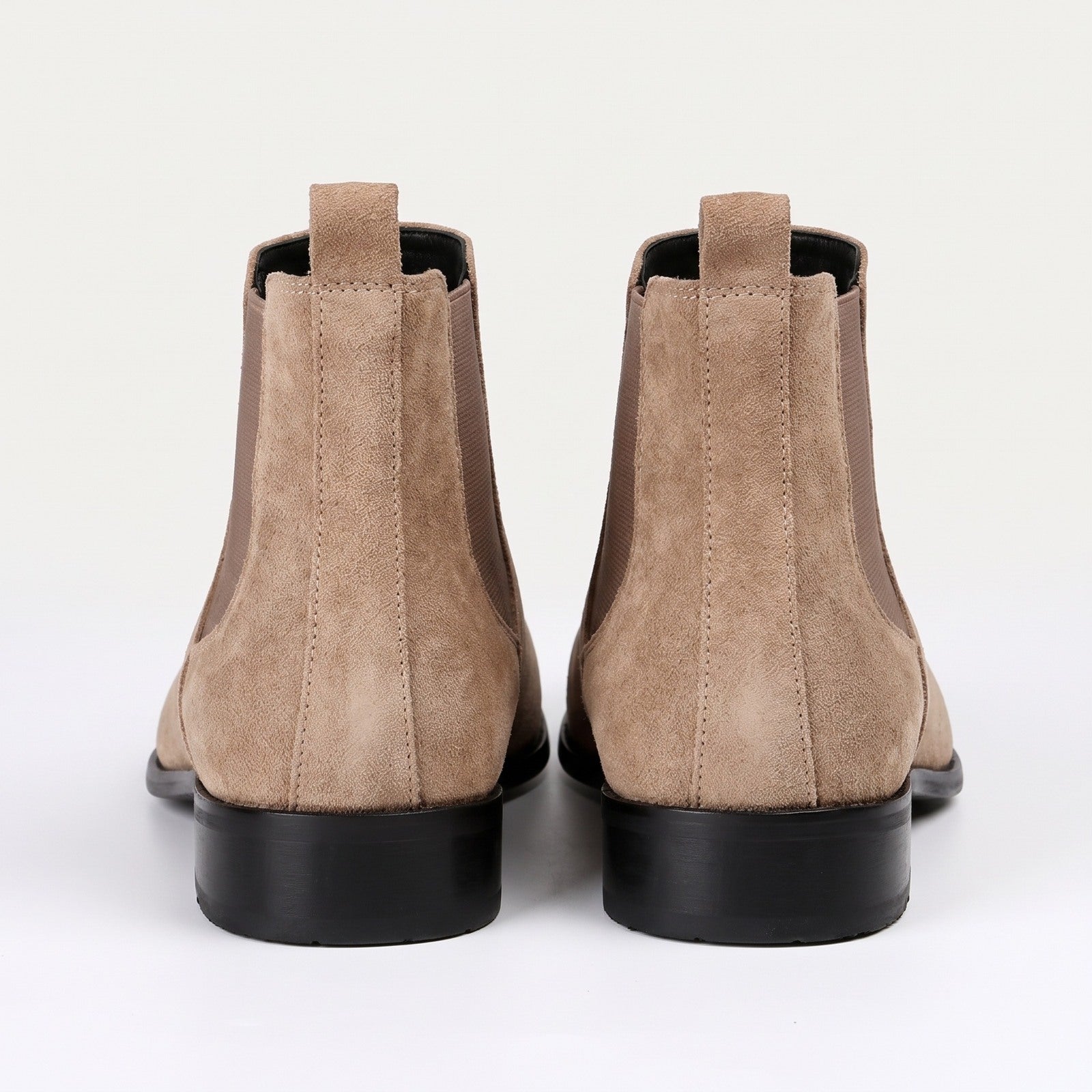 Pair of tan suede Chelsea boots with black soles, rear view | Chaps London