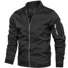 Black bomber jacket with ribbed collar, zip pockets, shown flat on model | Chaps London