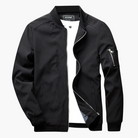 Black bomber jacket with zip pockets, worn open over white shirt | Chaps London