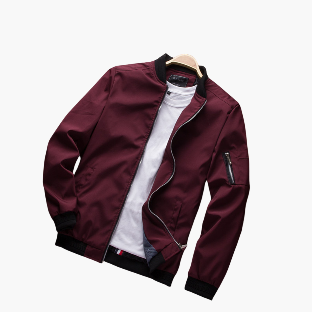 Maroon bomber jacket with black ribbed trim, shown on hanger | Chaps London