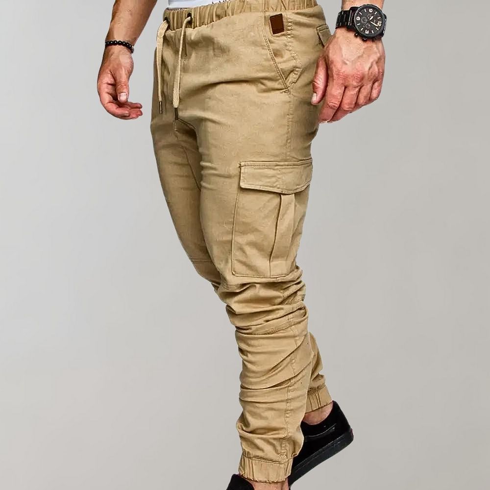 Man wearing khaki cargo joggers with drawstring waist and side pocket | Chaps London