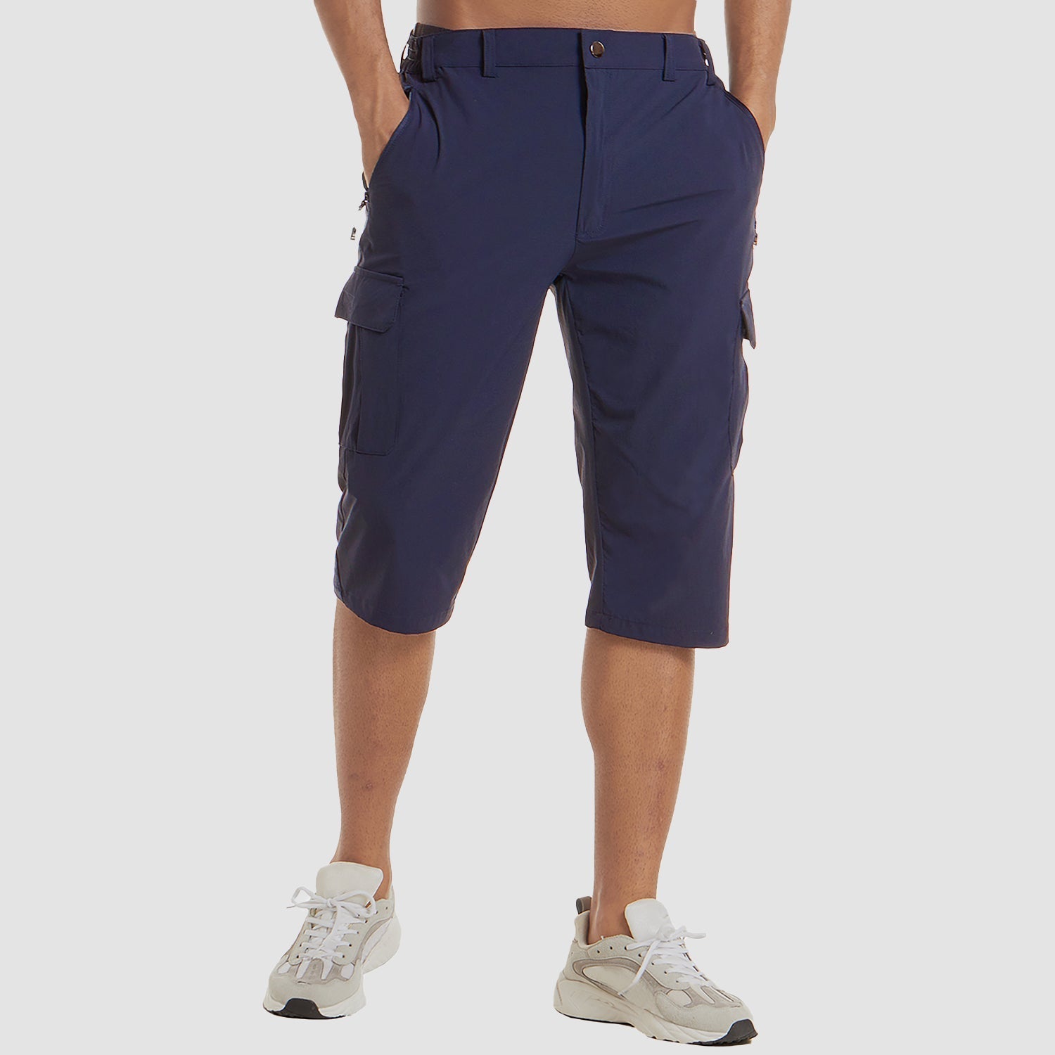 Man wearing navy blue quick-dry cargo shorts with white sneakers, front view | Chaps London