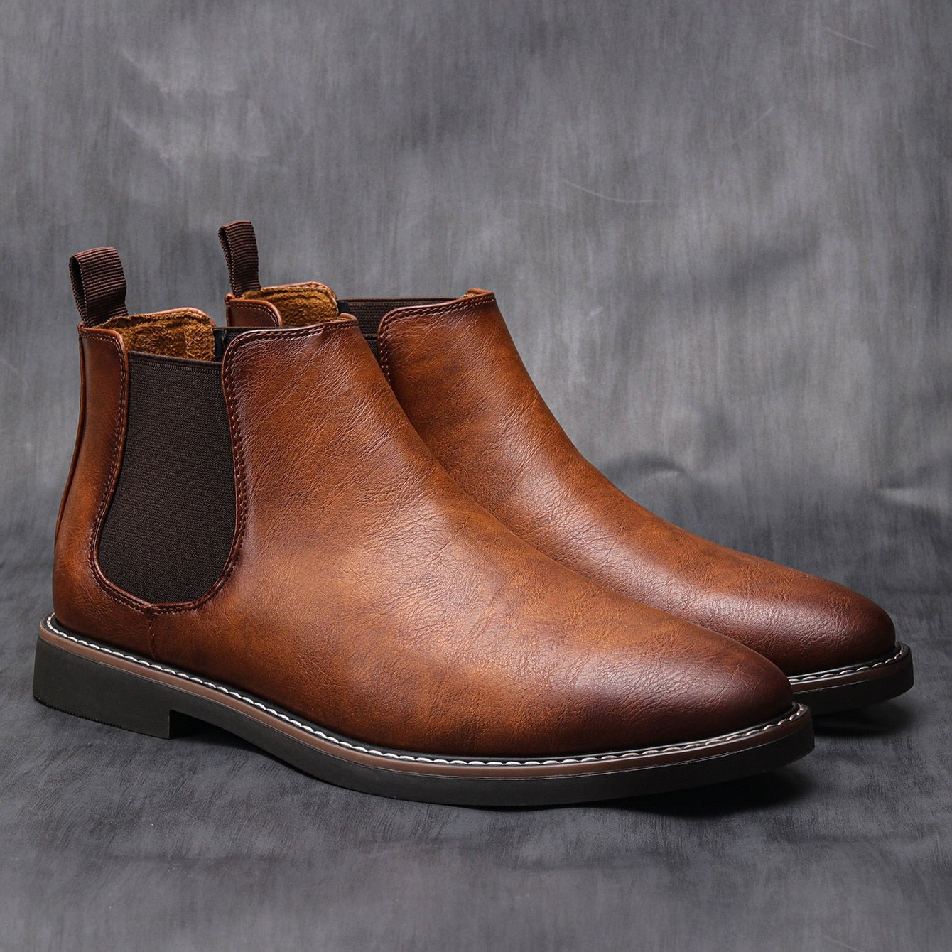 Brown leather Chelsea ankle boots with elastic side panels, shown as a pair | Chaps London