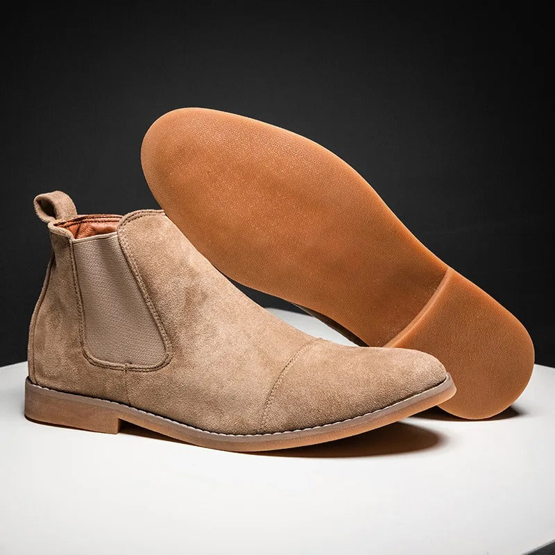 Tan Chelsea ankle boots shown paired, one upright, one tilted sideways | Chaps London