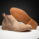 Tan Chelsea ankle boots shown paired, one upright, one tilted sideways | Chaps London