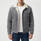 Man wearing gray corduroy sherpa-lined trucker jacket with white undershirt and jeans | Chaps London