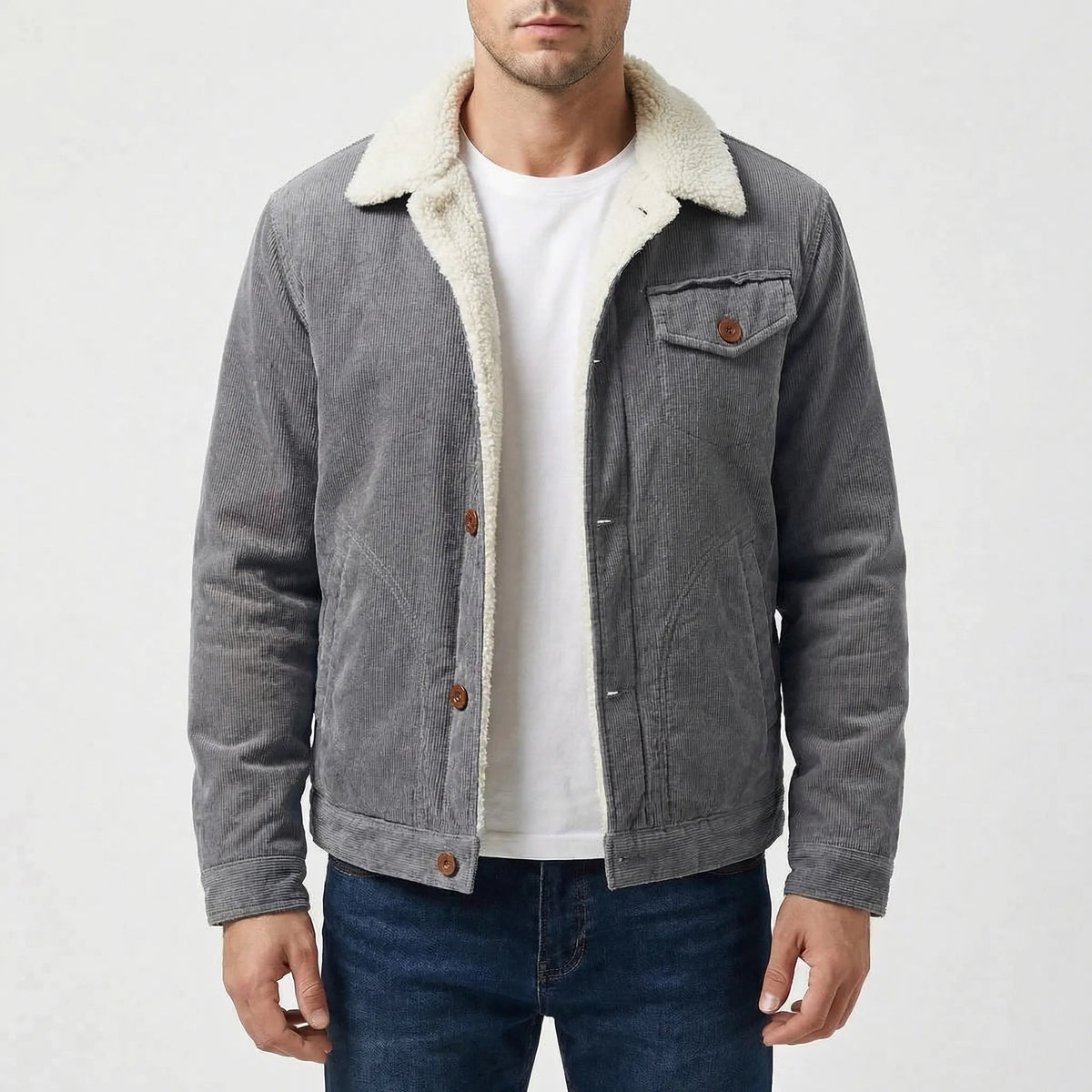 Man wearing gray corduroy sherpa-lined trucker jacket with white undershirt and jeans | Chaps London