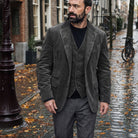Man walking down an autumn street in a charcoal corduroy jacket with notch lapels over a matching waistcoat | Chaps London