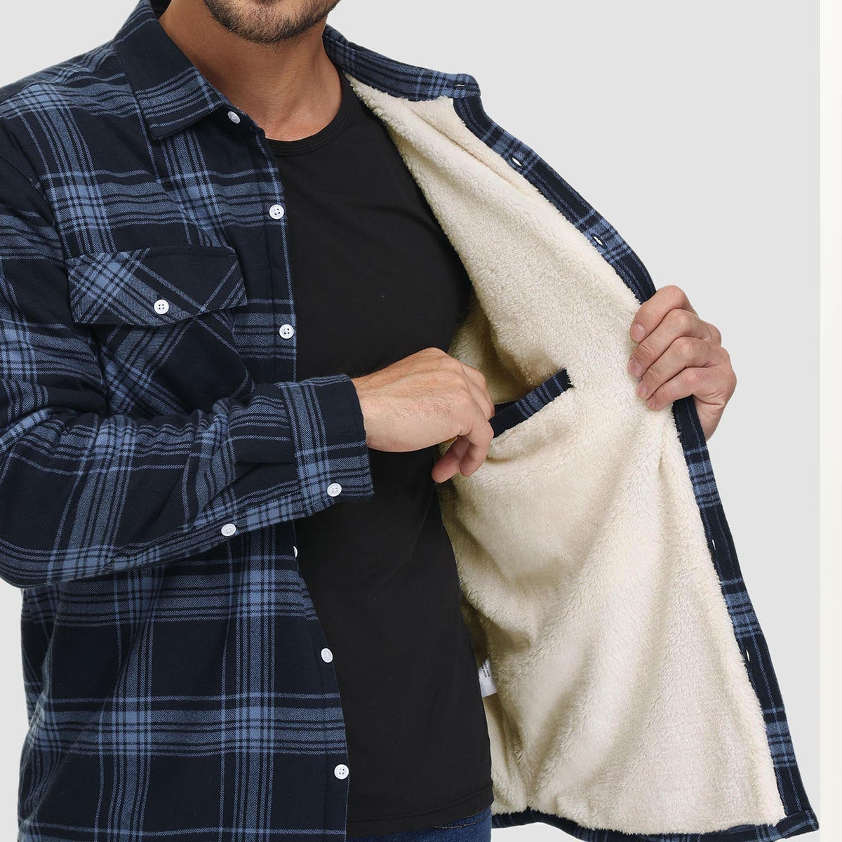 Man wearing navy plaid flannel jacket with cream fleece lining, open front | Chaps London