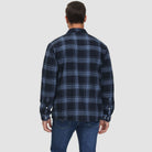 Man wearing navy blue plaid flannel overshirt jacket, back view, denim jeans | Chaps London