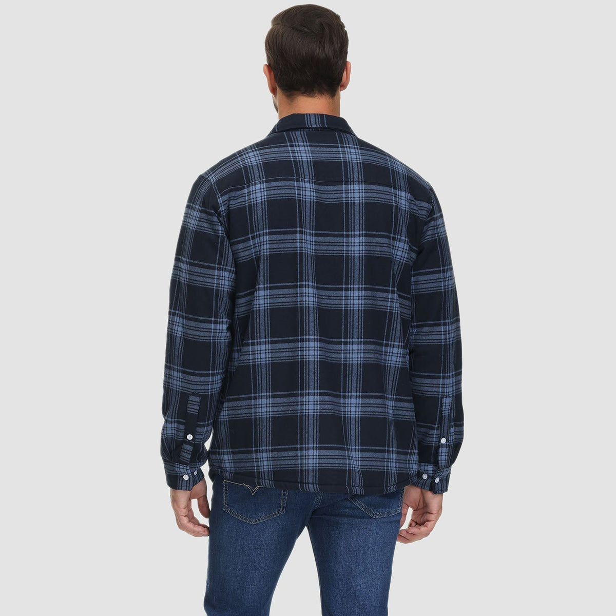 Man wearing navy blue plaid flannel overshirt jacket, back view, denim jeans | Chaps London